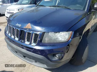2014 Jeep Compass Sport with VIN 1C4NJCBB0ED660610, listed as a IAAI auction lot 40506737 with 209,670 mi miles. Bid and sale history available at carsss.com. Image 6.