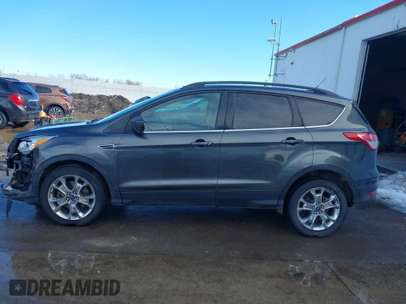 2015 Ford Escape SE with VIN 1FMCU9G98FUA70885, listed as a IAAI auction lot 41608240 with 54,802 mi miles. Bid and sale history available at carsss.com. Image 14.