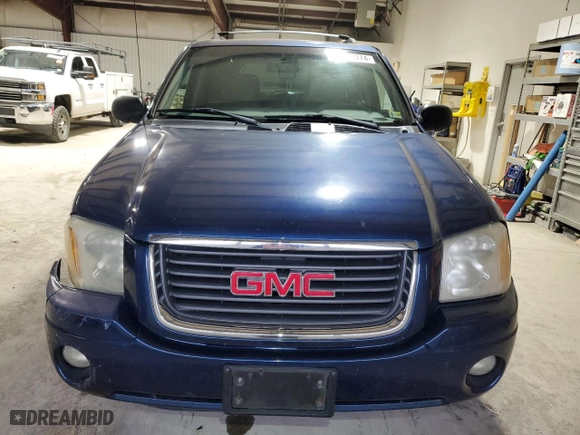 2004 GMC Envoy SLE with VIN 1GKDT13S942302025, listed as a Copart auction lot 84174174 with NaN miles and Salvage Title. Bid and sale history available at carsss.com. Image 5.