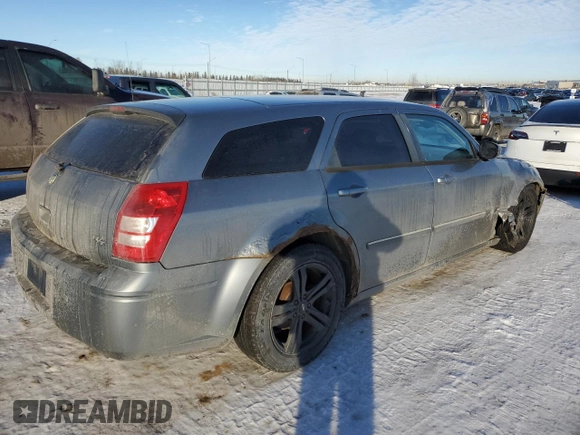 2006 Dodge Magnum R/T z VIN 2D4GV57256H187683, wystawiony jako Copart lot #87879585 z przebiegiem 260 895 mil mil oraz Szkody całkowita. Historia ofert i sprzedaży dostępna na DreamBid. Obrazek 3.