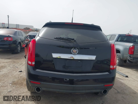 2013 Cadillac SRX z VIN 3GYFNAE3XDS654498, wystawiony jako IAAI lot #41740938 z przebiegiem 134 933 mil mil oraz . Historia ofert i sprzedaży dostępna na DreamBid. Obrazek 16.