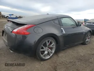 2014 Nissan 370Z Touring with VIN JN1AZ4EH2EM633814, listed as a Copart auction lot 84120274 with 22,979 mi miles and Salvage Title. Bid and sale history available at carsss.com. Image 3.
