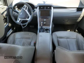 2014 Ford Edge SEL z VIN 2FMDK4JC7EBA36345, wystawiony jako Copart lot #53434145 z przebiegiem 184 955 mil mil oraz Szkoda całkowita • Salvage title. Historia ofert i sprzedaży dostępna na DreamBid. Obrazek 8.