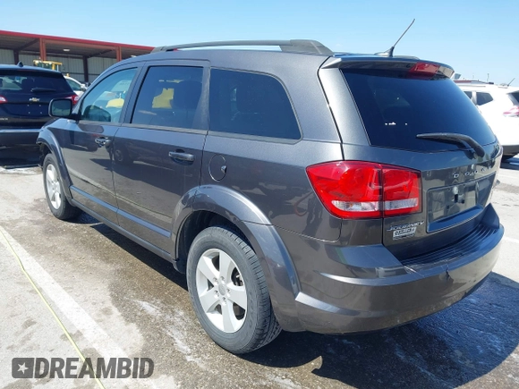 2014 Dodge Journey SE with VIN 3C4PDCAB7ET136799, listed as a IAAI auction lot 41972348 with 163,357 mi miles. Bid and sale history available at carsss.com. Image 3.