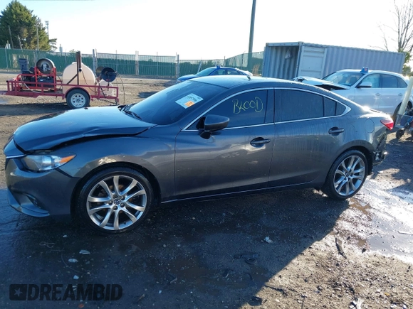 2014 Mazda 6 i Grand Touring with VIN JM1GJ1W50E1107877, listed as a IAAI auction lot 41857596 with 166,188 mi miles and . Bid and sale history available at DreamBid. Image 15.