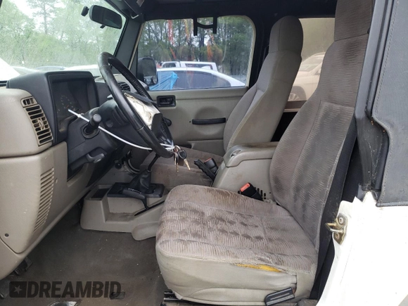 2005 Jeep Wrangler Sport z VIN 1J4FA49S55P334844, wystawiony jako Copart lot #52026835 z przebiegiem 209 216 mil mil oraz Czysty tytuł • Clean title. Historia ofert i sprzedaży dostępna na DreamBid. Obrazek 7.