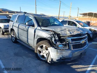 2016 Chevrolet Tahoe LS with VIN 1GNSCAKC0GR413515, listed as a IAAI auction lot 41249760 with 163,107 mi miles. Bid and sale history available at carsss.com. Image 1.