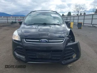 2013 Ford Escape SEL with VIN 1FMCU9H99DUA94169, listed as a IAAI auction lot 41937675 with 106,405 mi miles. Bid and sale history available at carsss.com. Image 13.