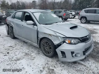 2013 Subaru Impreza Sedan WRX WRX with VIN JF1GV7E65DG030071, listed as a IAAI auction lot 41356066 with 170,090 mi miles. Bid and sale history available at carsss.com. Image 1.