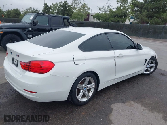 2014 BMW 4 Series 428i with VIN WBA3N3C54EF711449, listed as a IAAI auction lot 42422157 with 72,424 mi miles and . Bid and sale history available at DreamBid. Image 4.