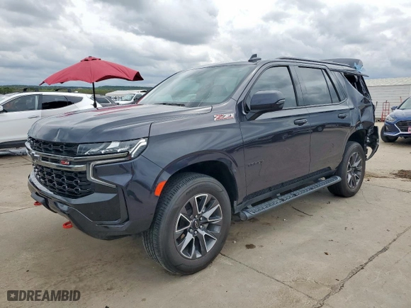 2022 Chevrolet Tahoe Z71 with VIN 1GNSKPKD8NR214482, listed as a Copart auction lot 49716155 with 52,681 mi miles and Salvage Title. Bid and sale history available at carsss.com. Image 1.