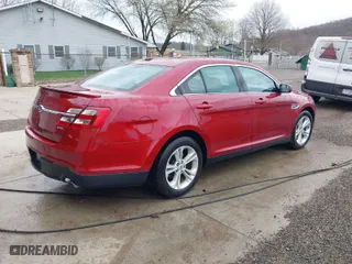 2014 Ford Taurus SEL with VIN 1FAHP2E87EG121203, listed as a IAAI auction lot 41908069 with 140,451 mi miles. Bid and sale history available at carsss.com. Image 4.