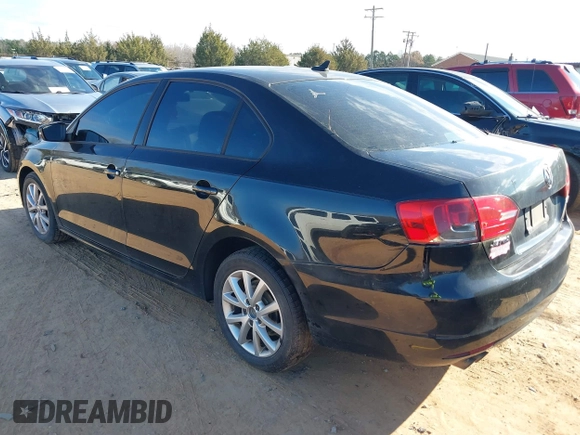 2012 Volkswagen Jetta Sedan SE w/Convenience with VIN 3VWDX7AJ5CM346105, listed as a IAAI auction lot 41142859 with 208,923 mi miles. Bid and sale history available at carsss.com. Image 3.