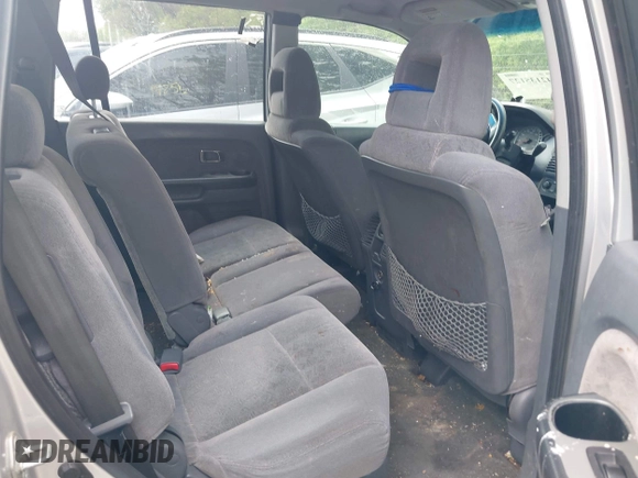 2005 Honda Pilot LX with VIN 2HKYF18185H572190, listed as a IAAI auction lot 42135127 with 201,768 mi miles. Bid and sale history available at carsss.com. Image 8.
