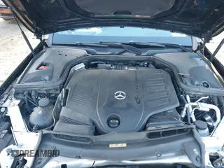 2021 Mercedes-Benz E-Class E 450 with VIN W1KZF5KB8MB002449, listed as a IAAI auction lot 41224307 with 57,093 mi miles. Bid and sale history available at carsss.com. Image 10.