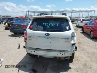 2015 Subaru Forester Touring with VIN JF2SJAWC0FH806493, listed as a IAAI auction lot 42355867 with 128,937 mi miles and . Bid and sale history available at DreamBid. Image 17.