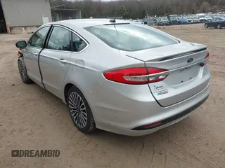 2017 Ford Fusion Titanium with VIN 3FA6P0SU2HR153423, listed as a IAAI auction lot 42029438 with 106,596 mi miles and . Bid and sale history available at DreamBid. Image 3.