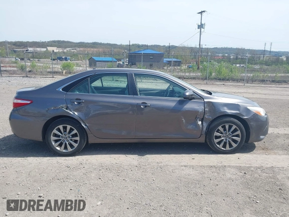 2015 Toyota Camry XLE with VIN 4T4BF1FK2FR495004, listed as a IAAI auction lot 42083465 with 114,941 mi miles and . Bid and sale history available at DreamBid. Image 13.