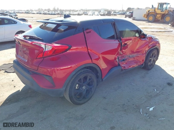 2021 Toyota C-HR LE with VIN JTNKHMBX2M1121238, listed as a IAAI auction lot 41417415 with 31,910 mi miles. Bid and sale history available at carsss.com. Image 4.