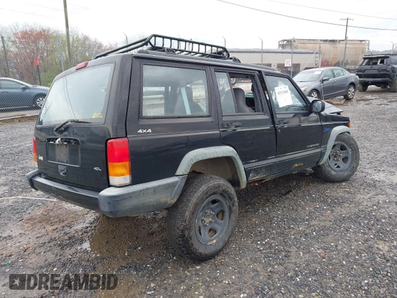 1998 Jeep Cherokee Sport z VIN 1J4FJ68S7WL264849, wystawiony jako IAAI lot #41931068 z przebiegiem Nie podano mil oraz . Historia ofert i sprzedaży dostępna na DreamBid. Obrazek 4.