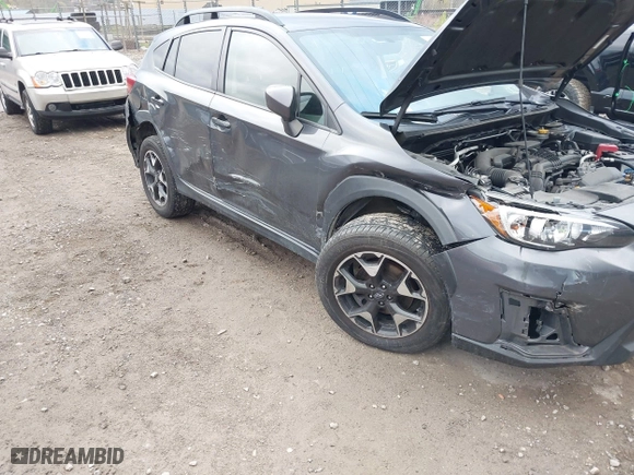 2020 Subaru Crosstrek Premium with VIN JF2GTAPC9L8241039, listed as a IAAI auction lot 42018676 with 58,146 mi miles. Bid and sale history available at carsss.com. Image 6.