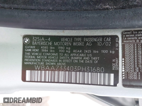 2003 BMW 3 Series 325i with VIN WBAAZ33403PH31680, listed as a IAAI auction lot 41726073 with 214,623 mi miles. Bid and sale history available at carsss.com. Image 9.