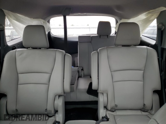 2020 Honda Pilot Touring 7-Passenger z VIN 5FNYF6H69LB005829, wystawiony jako Copart lot #52702555 z przebiegiem 90 746 mil mil oraz Szkoda całkowita • Salvage title. Historia ofert i sprzedaży dostępna na DreamBid. Obrazek 10.