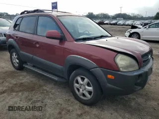 2005 Hyundai Tucson GLS with VIN KM8JN12D05U129525, listed as a Copart auction lot 79690934 with 169,061 mi miles and Salvage Title. Bid and sale history available at carsss.com. Image 4.