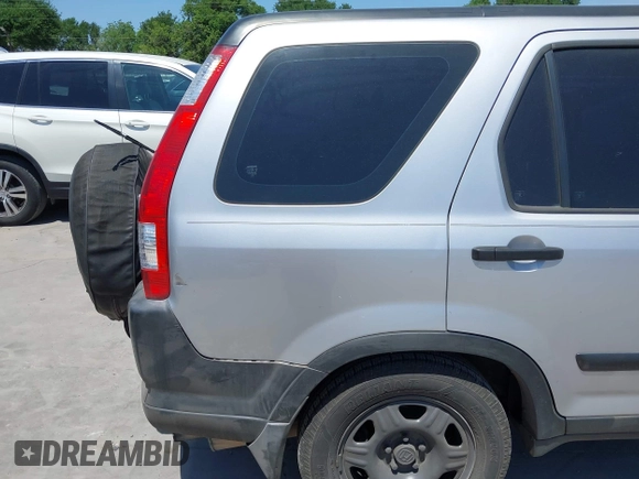 2005 Honda CR-V LX with VIN JHLRD685X5C011434, listed as a IAAI auction lot 42018369 with 234,993 mi miles and . Bid and sale history available at DreamBid. Image 13.