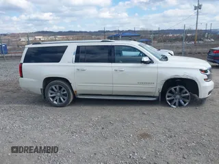 2015 Chevrolet Suburban LTZ with VIN 1GNSKKKC4FR304532, listed as a IAAI auction lot 41899860 with 123,624 mi miles. Bid and sale history available at carsss.com. Image 13.