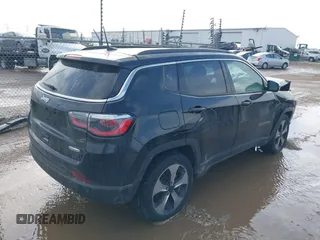 2020 Jeep Compass Latitude with VIN 3C4NJDBB1LT112676, listed as a IAAI auction lot 41651583 with 73,528 mi miles. Bid and sale history available at carsss.com. Image 4.