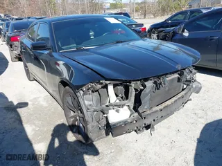 2018 Dodge Charger SXT with VIN 2C3CDXBG0JH197161, listed as a IAAI auction lot 41479910 with 137,612 mi miles. Bid and sale history available at carsss.com. Image 1.