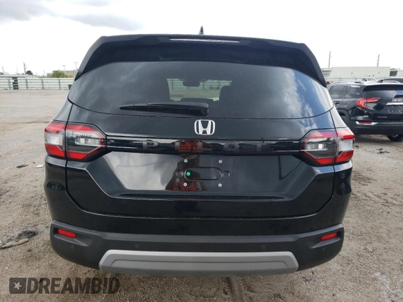 2024 Honda Pilot EX-L 8 Passenger with VIN 5FNYG2H47RB014185, listed as a Copart auction lot 67668944 with 3,981 mi miles and Salvage Title. Bid and sale history available at carsss.com. Image 6.