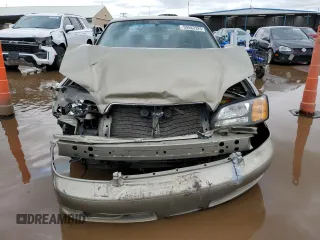 2000 Subaru Legacy with VIN 4S3BE6451Y7207874, listed as a Copart auction lot 59583325 with 57,861 mi miles and Salvage title. Bid and sale history available at DreamBid. Image 5.