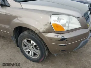 2004 Honda Pilot EX with VIN 2HKYF18594H523176, listed as a IAAI auction lot 41937743 with 310,344 mi miles. Bid and sale history available at carsss.com. Image 17.