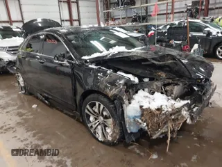 2015 Lincoln MKZ Hybrid with VIN 3LN6L2LU4FR602416, listed as a IAAI auction lot 41357234 with 170,593 mi miles. Bid and sale history available at carsss.com. Image 1.