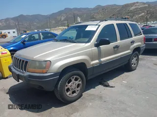 2001 Jeep Grand Cherokee Laredo with VIN 1J4GX48S01C606559, listed as a IAAI auction lot 42384286 with 149,146 mi miles and . Bid and sale history available at DreamBid. Image 2.