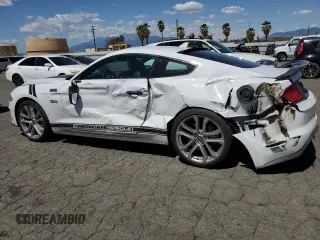 2022 Ford Mustang GT with VIN 1FA6P8CF9N5136633, listed as a Copart auction lot 51869985 with 34,974 mi miles and Salvage Title. Bid and sale history available at carsss.com. Image 2.