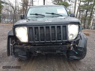 2008 Jeep Liberty Sport with VIN 1J8GN28K28W106520, listed as a IAAI auction lot 41995195 with 211,275 mi miles. Bid and sale history available at carsss.com. Image 6.