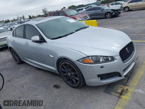 2015 Jaguar XF V6 Portfolio with VIN SAJWA0F79F8U77985, listed as a IAAI auction lot 41386030 with 81,335 mi miles. Bid and sale history available at carsss.com. Image 1.