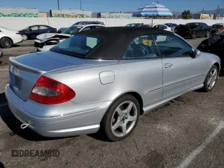 2007 Mercedes-Benz CLK 550 with VIN WDBTK72F27T076330, listed as a Copart auction lot 80770694 with 126,018 mi miles and Salvage Title. Bid and sale history available at DreamBid. Image 3.