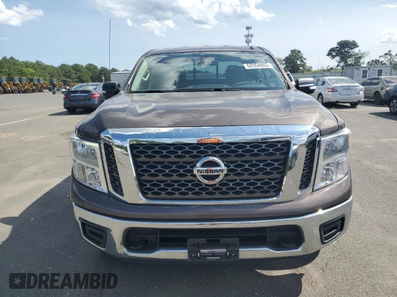 2017 Nissan Titan SV z VIN 1N6AA1EJ9HN543447, wystawiony jako Copart lot #57622105 z przebiegiem 105 975 mil mil oraz Nie do naprawy • Non repairable. Historia ofert i sprzedaży dostępna na DreamBid. Obrazek 5.