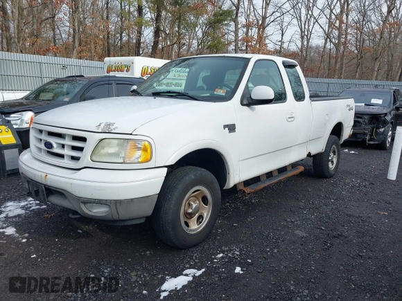 2003 Ford F-150 XL with VIN 1FTRX18W43NB84285, listed as a IAAI auction lot 41494919 with 197,352 mi miles. Bid and sale history available at carsss.com. Image 2.