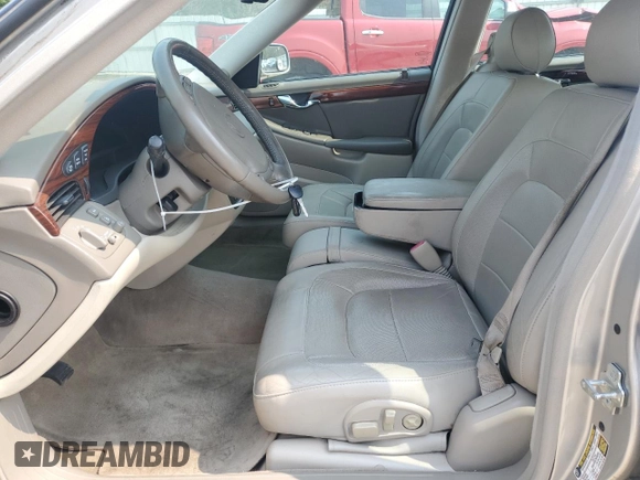 2005 Cadillac DeVille z VIN 1G6KD54Y85U187078, wystawiony jako Copart lot #58547715 z przebiegiem 95 905 mil mil oraz Szkoda całkowita • Salvage title. Historia ofert i sprzedaży dostępna na DreamBid. Obrazek 7.