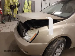 2007 Kia Sedona EX with VIN KNDMB233576160010, listed as a IAAI auction lot 41666497 with 206,834 mi miles. Bid and sale history available at carsss.com. Image 6.