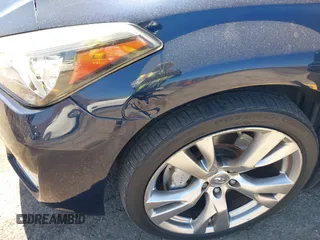 2015 Infiniti Q70 with VIN JN1BY1PP8FM601834, listed as a IAAI auction lot 42028330 with 106,285 mi miles and . Bid and sale history available at DreamBid. Image 18.