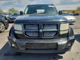 2011 Dodge Nitro Heat z VIN 1D4PT4GX6BW506192, wystawiony jako Copart lot #58795955 z przebiegiem 231 377 mil mil oraz Szkoda całkowita • Salvage title. Historia ofert i sprzedaży dostępna na DreamBid. Obrazek 5.