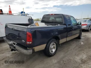 1999 Ford F-150 XL with VIN 1FTRX17L2XKB00768, listed as a Copart auction lot 50088124 with 294,478 mi miles and Salvage Title. Bid and sale history available at carsss.com. Image 3.
