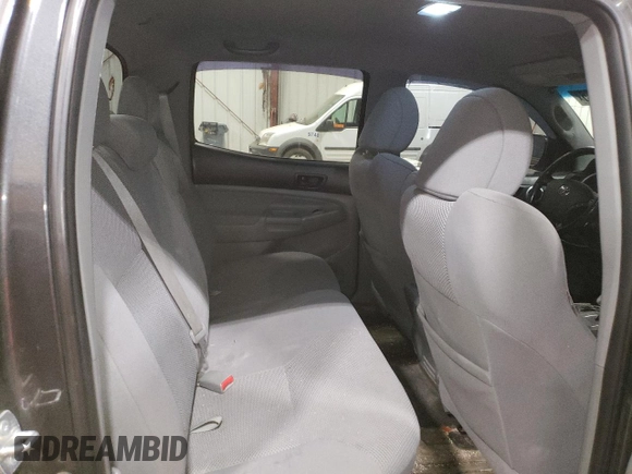2009 Toyota Tacoma z VIN 3TMLU42N79M027000, wystawiony jako Copart lot #58371365 z przebiegiem 168 989 mil mil oraz Szkoda całkowita • Salvage title. Historia ofert i sprzedaży dostępna na DreamBid. Obrazek 10.