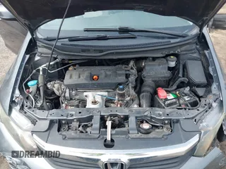 2012 Honda Civic LX z VIN 19XFB2F52CE389822, wystawiony jako IAAI lot #41960928 z przebiegiem 66 170 mil mil oraz . Historia ofert i sprzedaży dostępna na DreamBid. Obrazek 10.